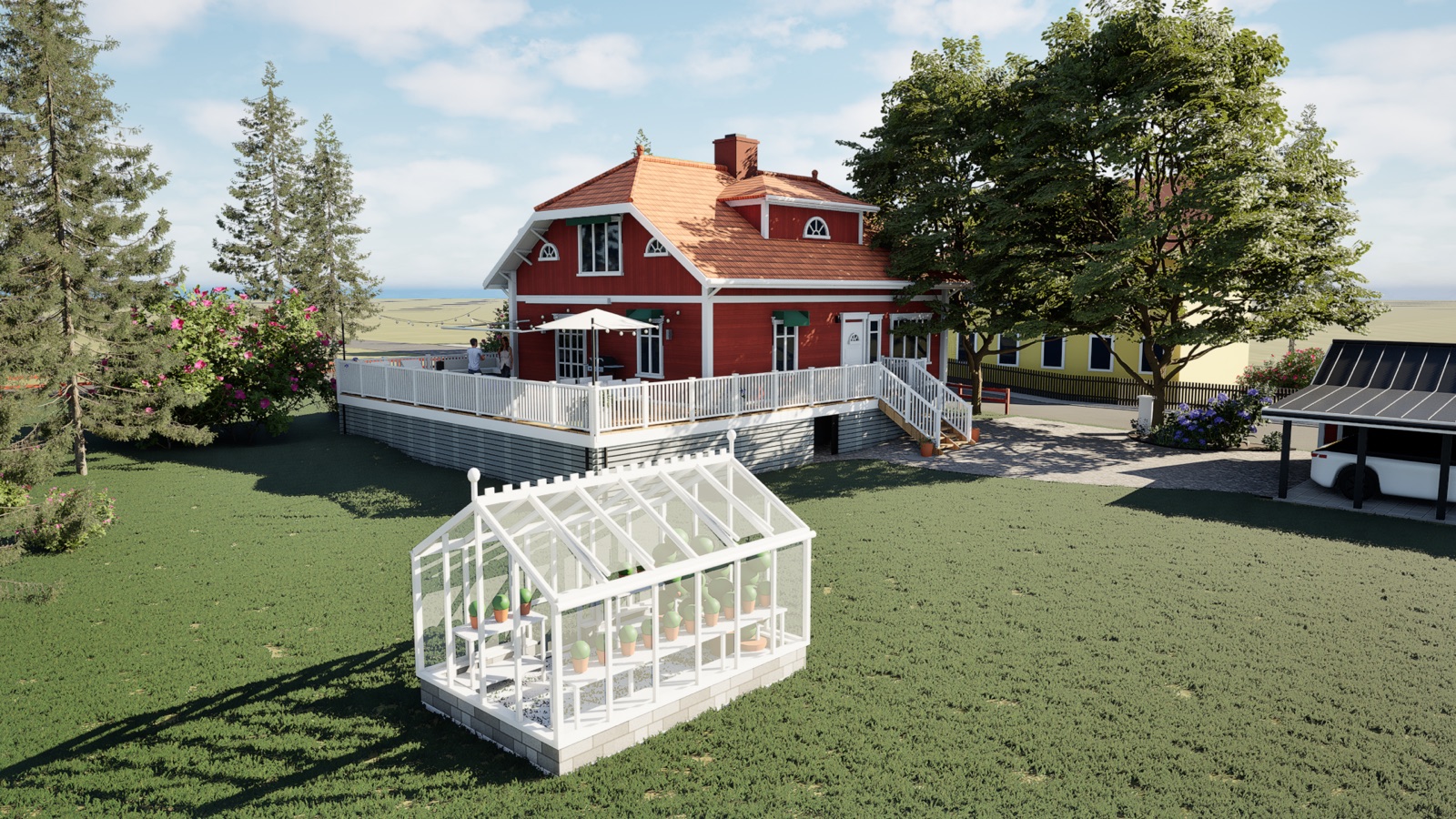 Ett vitt växthus på gräsmattan framför huset och den nya altanen en junimorgon